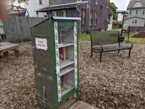 A photo of our Little Free Library in the Community Garden